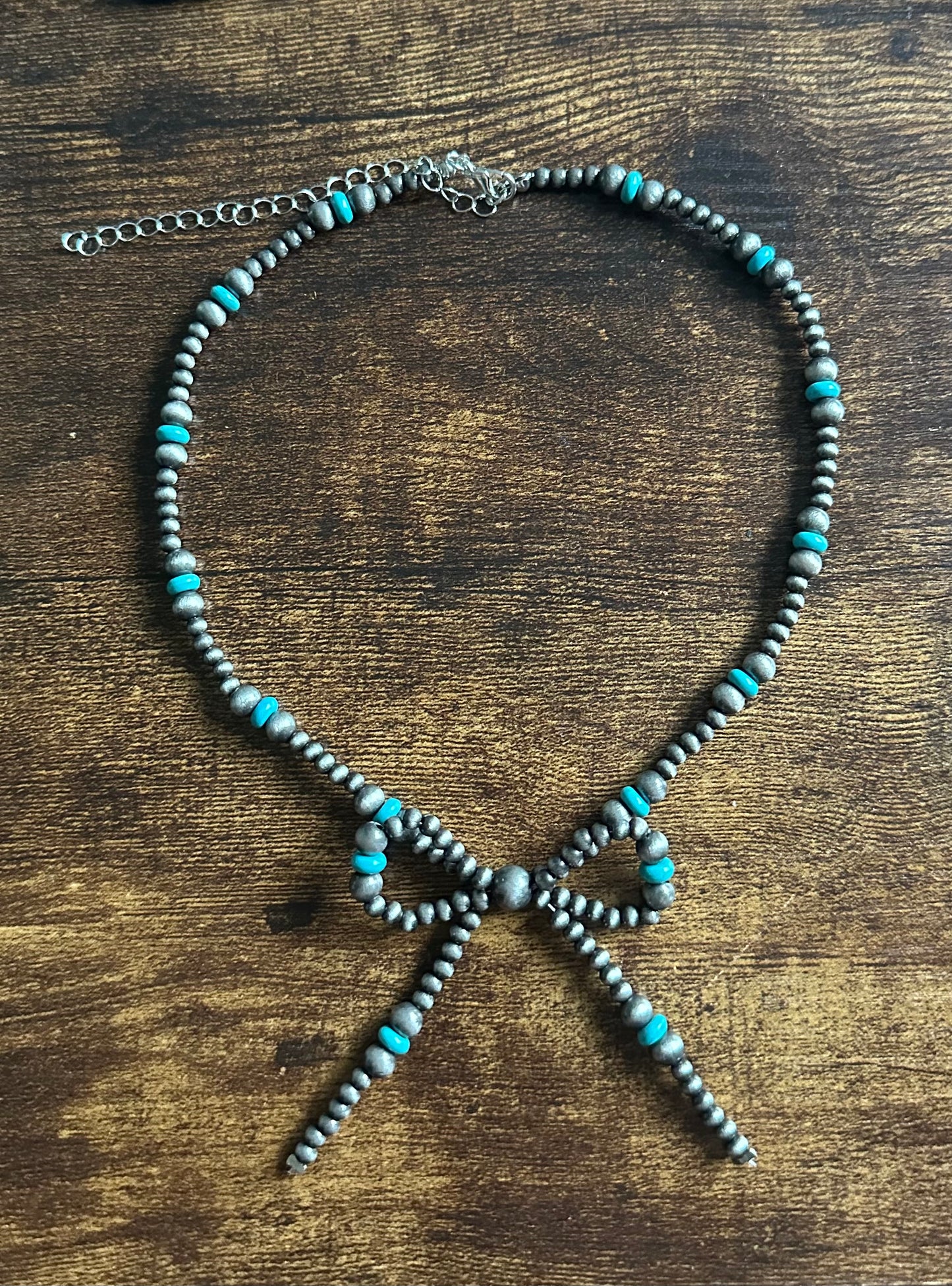 Faux pearl bow necklace