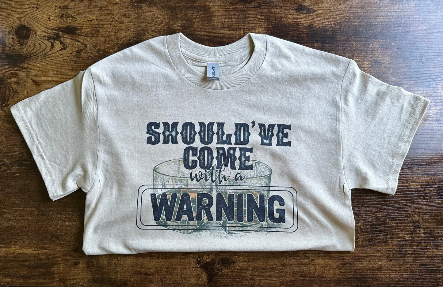 Should’ve come with a warning tee crewneck